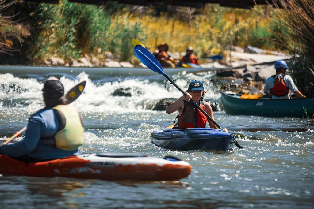 (Sage Nightingale, sponsored) | Kayakers paddle the Jordan River as part of a Jordan River Commission event in West Jordan and Midvale near Bingham Junction.