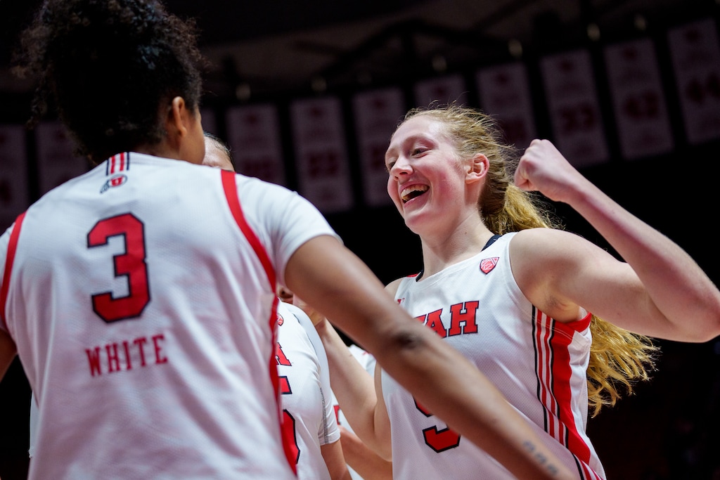 (Trent Nelson | The Salt Lake Tribune) Utah Utes guard Lani White (3) and Utah Utes guard Gianna Kneepkens (5) celebrate a three-point play as Utah hosts Washington, NCAA basketball in Salt Lake City on Friday, Feb. 10, 2023.