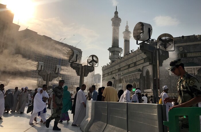 Large cooling fans spray water on Muslim pilgrims around the Grand Mosque ahead of the annual hajj pilgrimage in the Muslim holy city of Mecca, Saudi Arabia, Tuesday, Aug. 29, 2017. (AP Photo/Khalil Hamra)