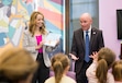 (Bethany Baker | The Salt Lake Tribune) First lady Abby Cox, left, and Gov. Spencer Cox speak with children following a news conference on the 2027 fiscal budget at Kearns Library in Kearns on Wednesday, Dec. 3, 2025.