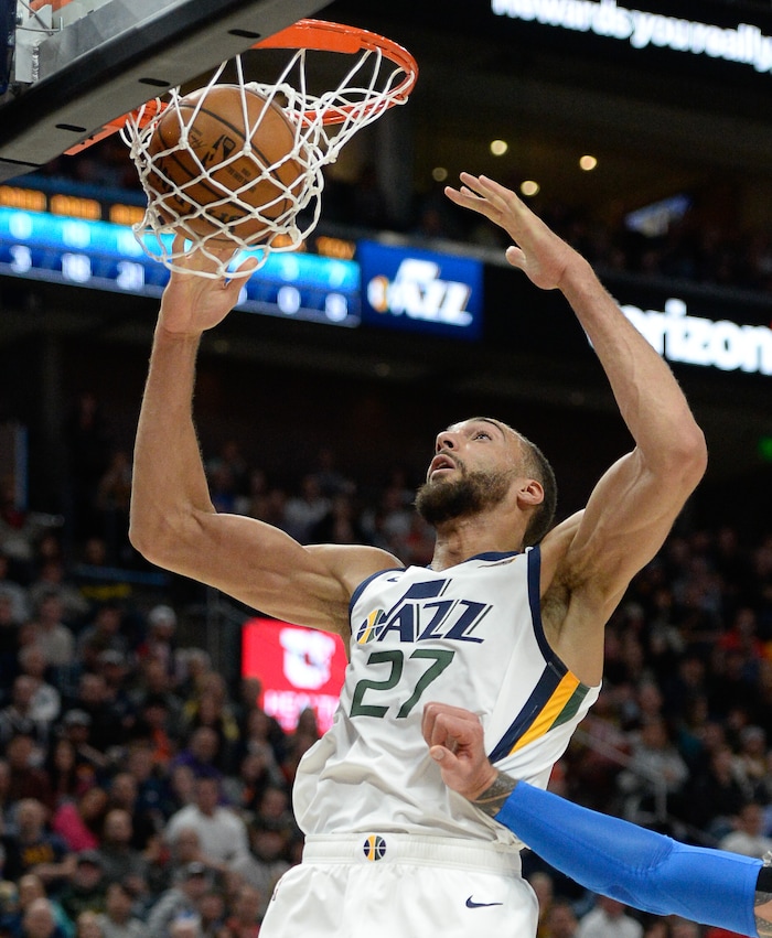 (Francisco Kjolseth  |  The Salt Lake Tribune)  Utah Jazz center Rudy Gobert (27) sinks his shot as the Utah Jazz host the Oklahoma City Thunder in their NBA basketball game at Vivint Smart Home Arena in Salt Lake City on Mon. Dec. 9, 2019.