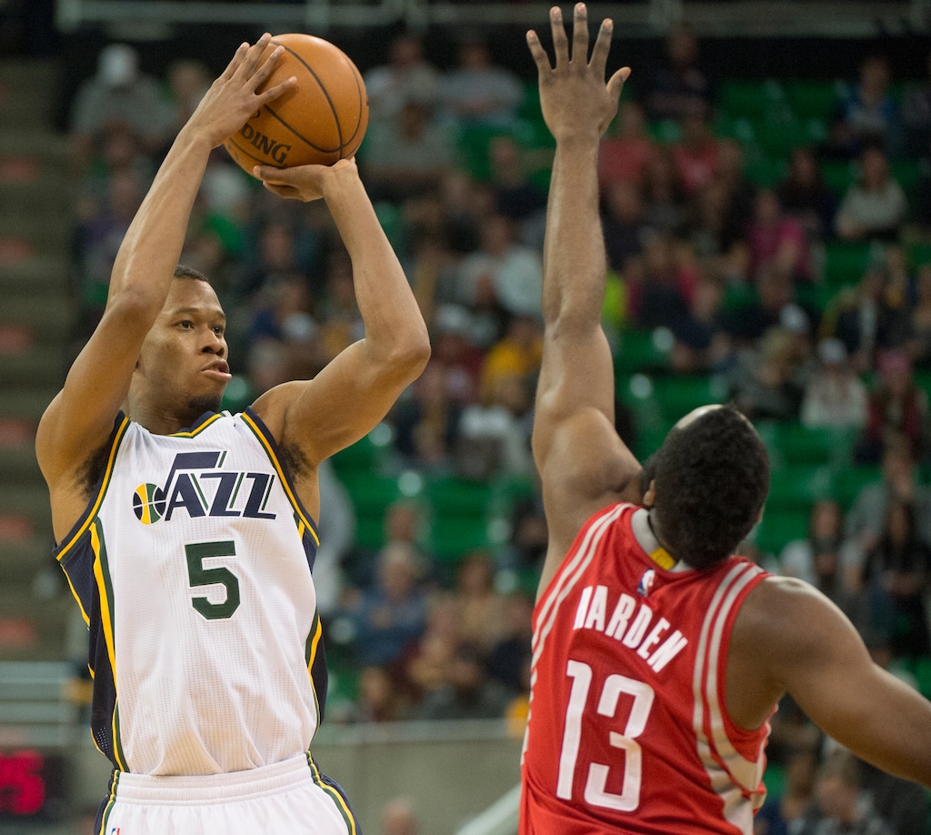 Rick Egan  |  The Salt Lake TribuneUtah Jazz guard Rodney Hood (5) shoots overHouston Rockets guard James Harden (13) in NBA action, The Utah Jazz vs. The Houston Rockets, in Salt Lake City, Monday, January 4, 2016.