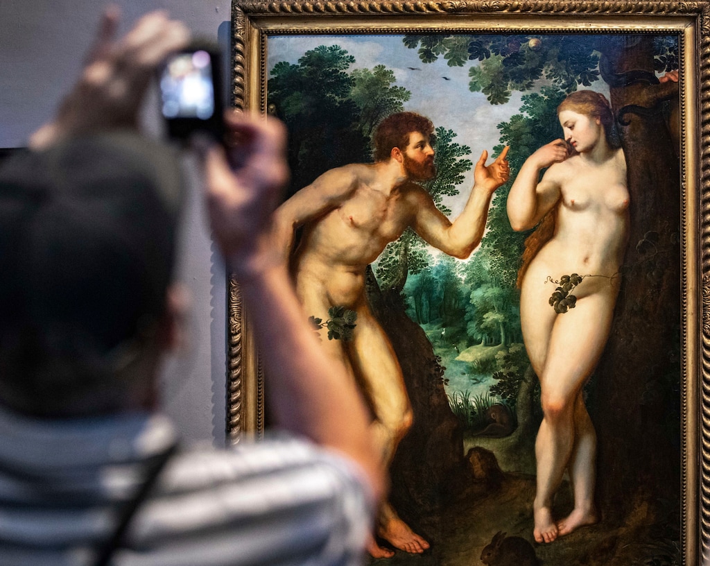 (Olivier Matthys for the AP) Visitors examine the painting "Adam and Eve" by Flemish master Peter Paul Rubens in Antwerp, Belgium. Latter-day Saint leaders have used Adam and Eve to support a wide range of sometimes-conflicting ideals about marriage and gender.