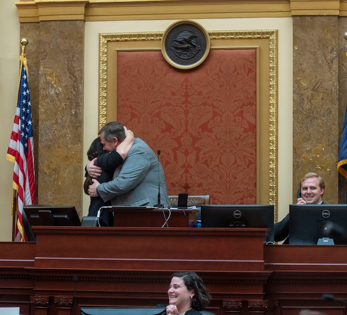 (Rick Egan  |  The Salt Lake Tribune)   Acting speaker, Rep. Eric Hutchings breaks House protocol as he interrupts last-day business on the floor to announce that he and his wife Stacey are celebrating their 22nd wedding anniversary today. Thursday, March 14, 2019. After chants from members of the house, he gave her a kiss on the Dais.