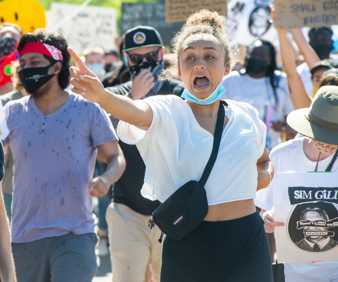 (Rick Egan  |  The Salt Lake Tribune)     Bella Swan sings as she dances to Aretha Franklin, as protesters dance on Football drive during a march for Justice onSunday, July 12, 2020.