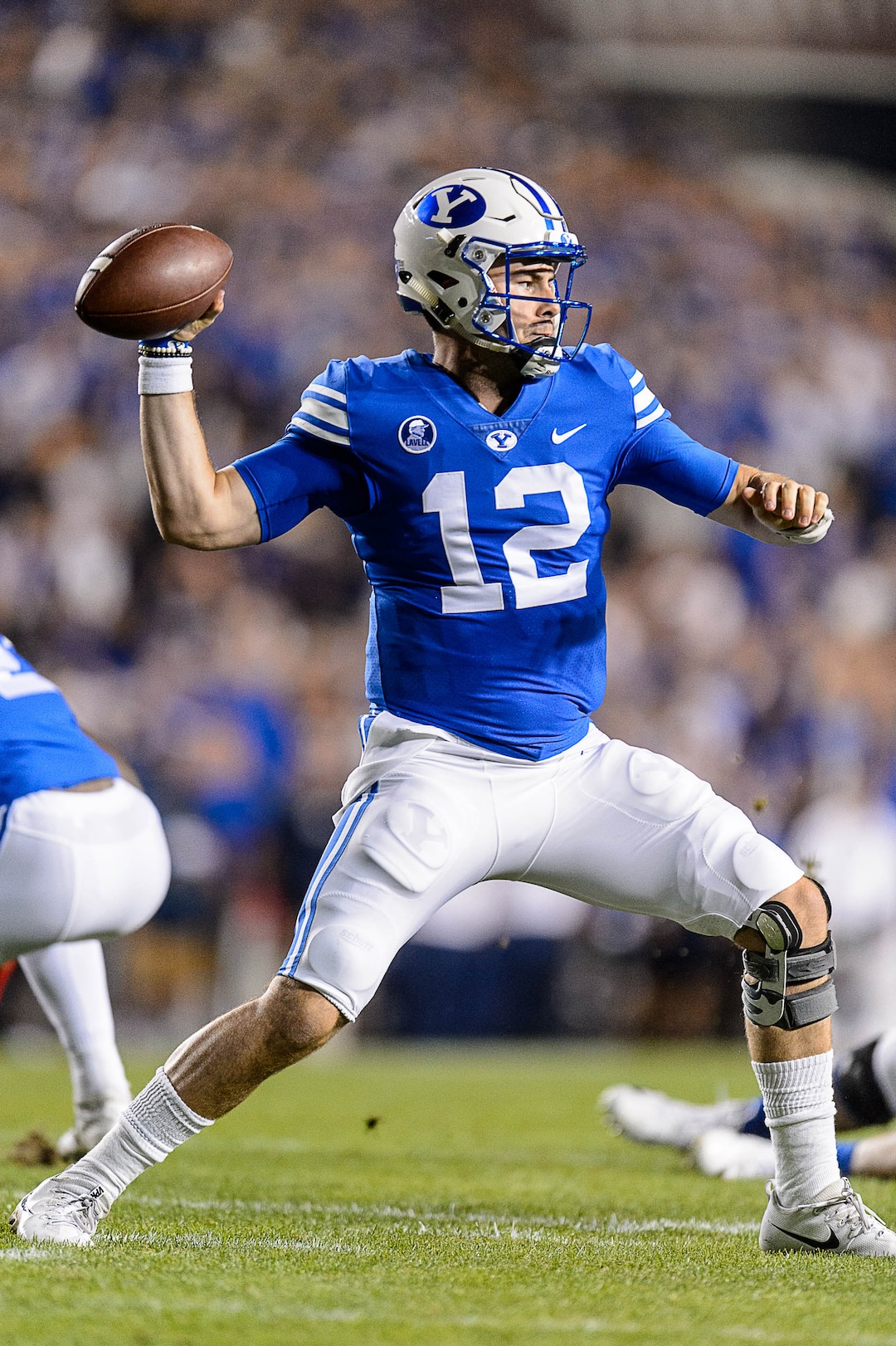 (Trent Nelson | The Salt Lake Tribune)  Brigham Young Cougars quarterback Tanner Mangum (12) throws as BYU hosts Utah, NCAA football in Provo, Saturday September 9, 2017.