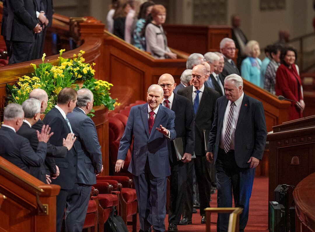 (Leah Hogsten | The Salt Lake Tribune) Members of the First Presidency of The Church of Jesus Christ of Latter-day Saints, center, Russell M. Nelson, waving, Dallin H. Oaks and Henry B. Eyring, arrive for the spring General Conference Saturday, April 1, 2023.