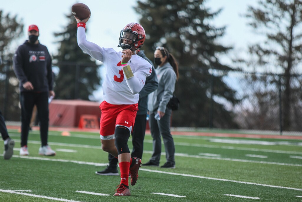 (Sarah Shebek | University of Utah Athletics) Utah quarterback Ja'Quinden Jackson throws a pass during spring practice Tuesday, March 16, 2021. Jackson is trying to move forward after Utes players Aaron Lowe and Ty Jordan died from gunshot wounds in the same year.