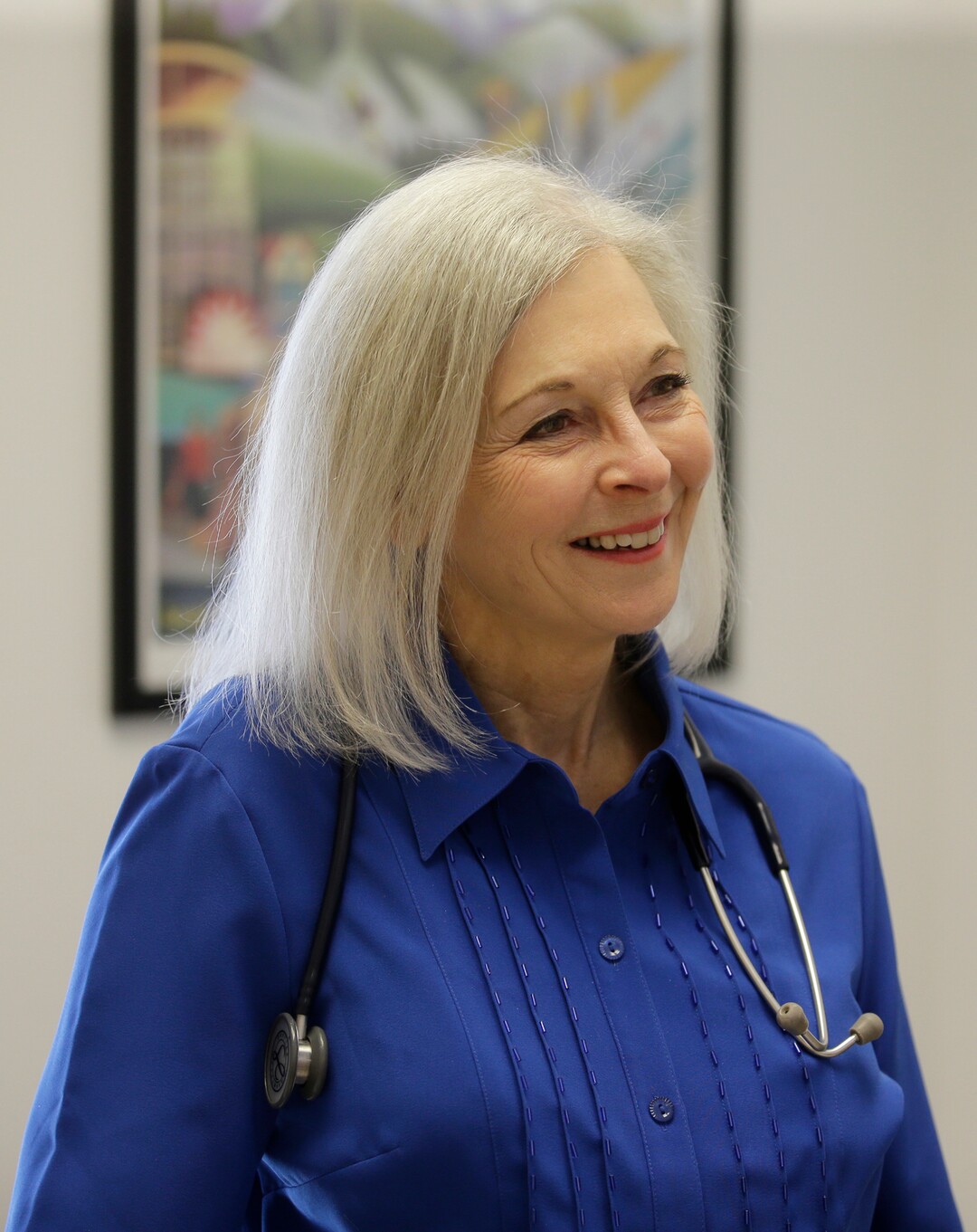 FILE--In this March 14, 2017, file photo, Utah democratic U.S. House candidate Dr. Kathryn Allen speaks during an interview at a clinic in Salt Lake City. New campaign finance reports show that Allen significantly outpaced incumbent Republican Rep. Jason Chaffetz in fundraising last quarter. (AP Photo/Rick Bowmer, file)