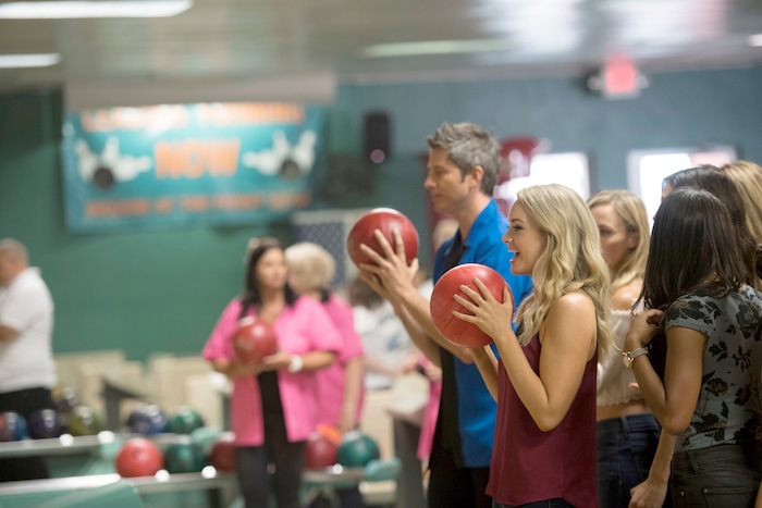 (Paul Hebert | ABC) At the beginning of the group date, Jenna, at right, and the other women were all smiles. "It's just bowling," Bachelor Arie Luyendyk Jr. tells another contestant after her display of poor sportsmanship on the current season of "The Bachelor."
