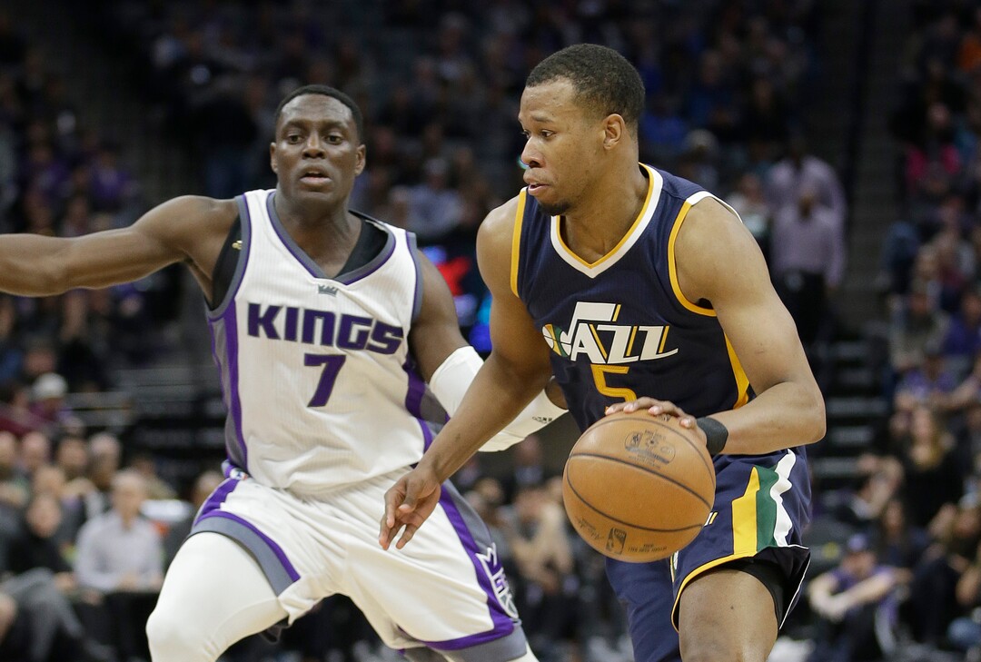 Utah Jazz guard Rodney Hood, right, drives against Sacramento Kings guard Darren Collison during the second half of an NBA basketball game Sunday, March 5, 2017, in Sacramento, Calif. The Jazz won, in overtime, 110-109. (AP Photo/Rich Pedroncelli)