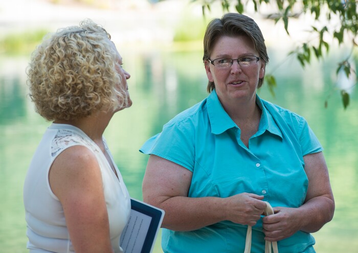 (Rick Egan  |  The Salt Lake Tribune)       Salt Lake CIty Mayor Jackie Biskupski chats with Amy Barry during the grand reopening celebration for Fairmont Park Pond, Wednesday, June 27, 2018.