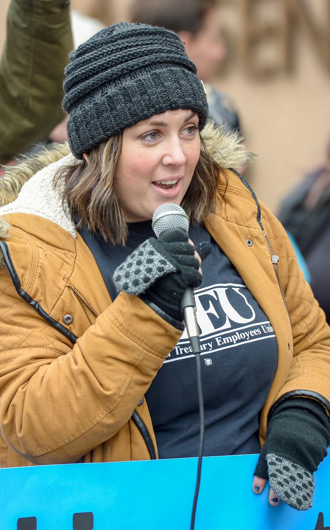 Leah Hogsten  |  The Salt Lake Tribune  Internal Revenue Service employee Krystal Kirkpatrick rallies in protest of the ongoing partial federal shutdown outside Federal Building in Ogden, Jan. 10, 2019. Kirkpatrick says she made a trip to the Utah Food Bank Thursday to help feed her family.