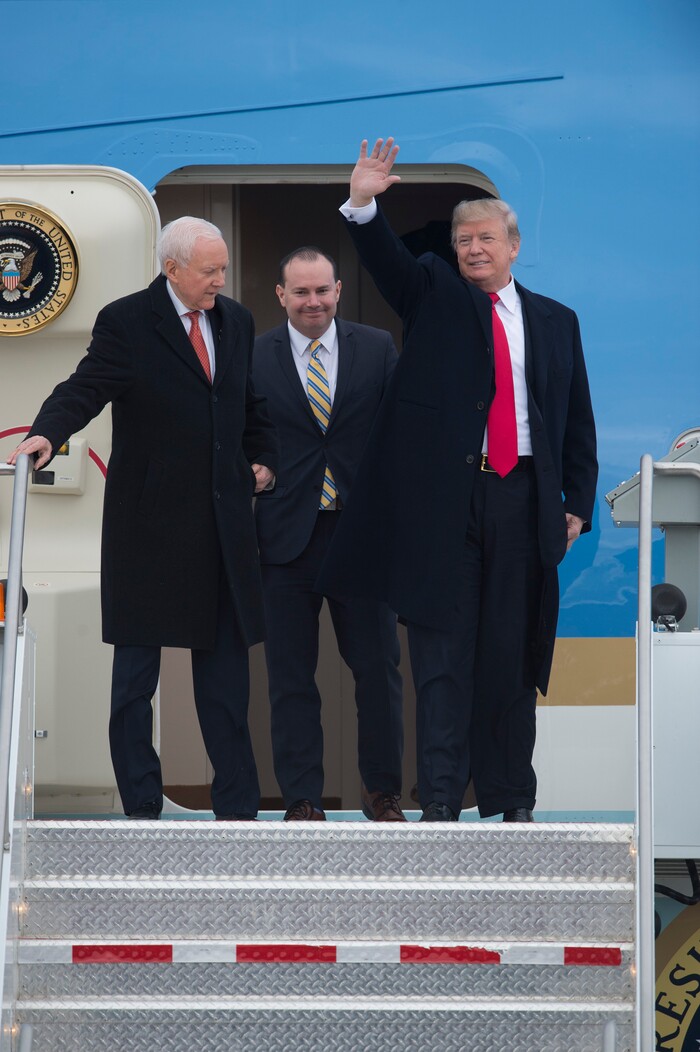 (Scott Sommerdorf   |  The Salt Lake Tribune)   President Trump deplanes from Air Force One with Senators Hatch and Lee at the Ronald R Wright National Air Guard Base, Monday, December 4, 2017.  
