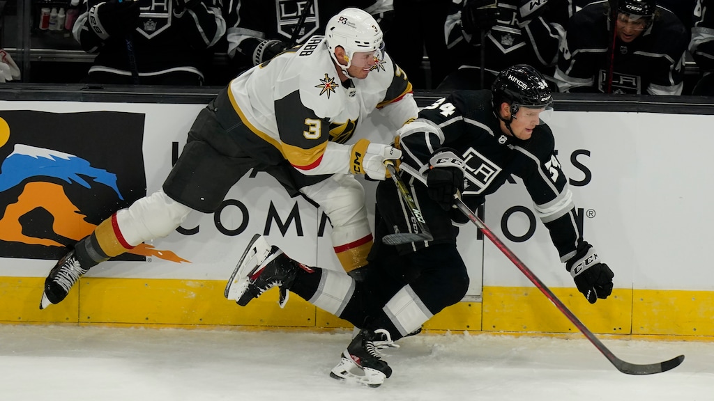 (Rick Bowmer | AP) Las Vegas Golden Knights defenseman Brayden McNabb (3) and Los Angeles Kings right wing Arthur Kaliyev (34) battle for the puck during the first period of an NHL preseason hockey game Thursday, Oct. 6, 2022, in Salt Lake City.