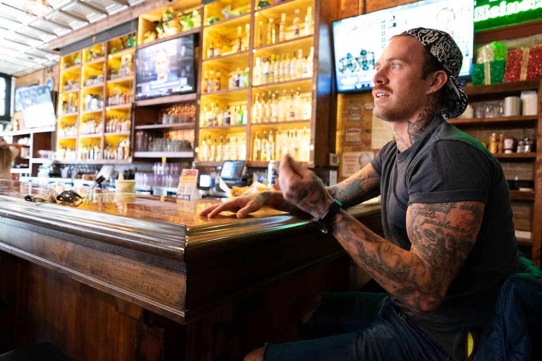 (Francisco Kjolseth  | The Salt Lake Tribune) Dave Forsman, an associate librarian for The City Library tries to support local establishments with his limited dollars as he enjoys a beer at the Green Pig Pub during a slow lunch hour in downtown Salt Lake City on Thursday, Dec. 3, 2020. The owners of 25 different Utah bars — including the Green Pig Pub —  have sent a letter to Gov. Gary Herbert protesting the state health order that requires alcohol service to stop at 10 p.m They say the restriction is devastating the bar industry in Utah and has caused hundreds of thousands of dollars in lost  revenue, hurt employees, and could force many to close.