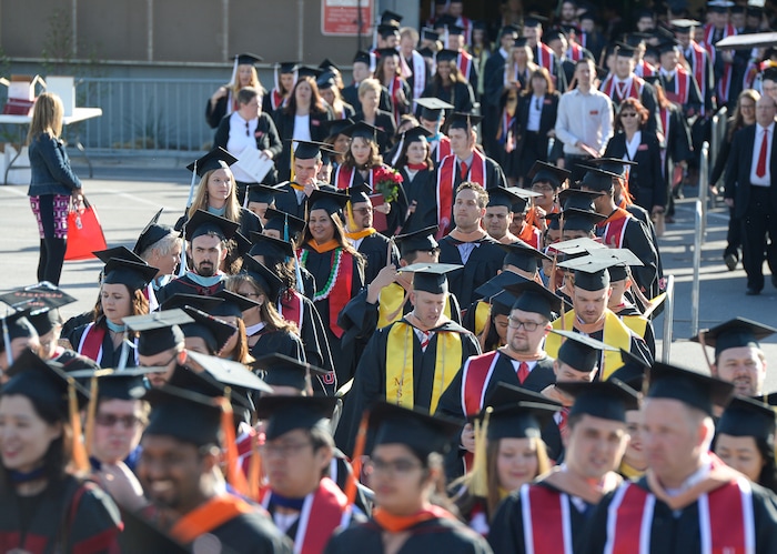 (Francisco Kjolseth  |  The Salt Lake Tribune)  University of Utah in Salt Lake City begins their celebration of its largest graduating class with 8,568 graduates for their 2018 commencement ceremonies on Thursday, May 3, 2018, on their way to the Jon M. Huntsman Center.