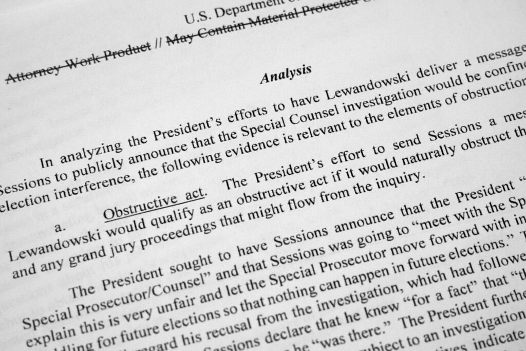 (Jon Elswick | Associated Press file photo)  Special counsel Robert Mueller's redacted report on the investigation into Russian interference in the 2016 presidential election is photographed Thursday, April 18, 2019, in Washington.