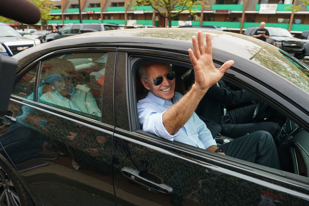 Democratic presidential candidate and former Vice President Joe Biden waves goodbye after stopping at Gianni's Pizza, in Wilmington Del., Thursday, April 25, 2019. Jessica Griffin/The Philadelphia Inquirer via AP)