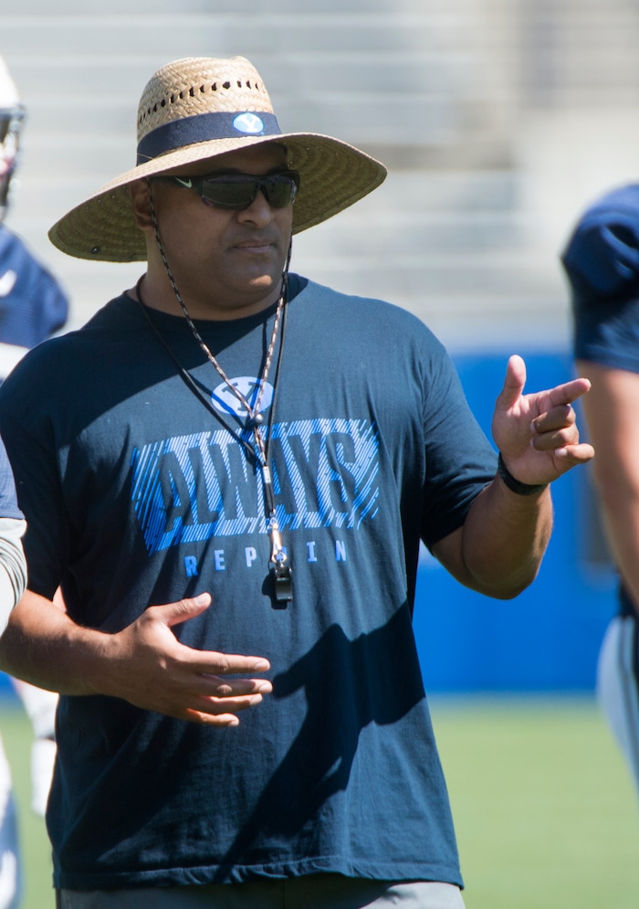 (Rick Egan  |  The Salt Lake Tribune)  BYU head coach, Kalani Sitake, observes his players, during the Cougars scrimmage at Lavell Edwards Stadium, Thursday, August 17, 2017.