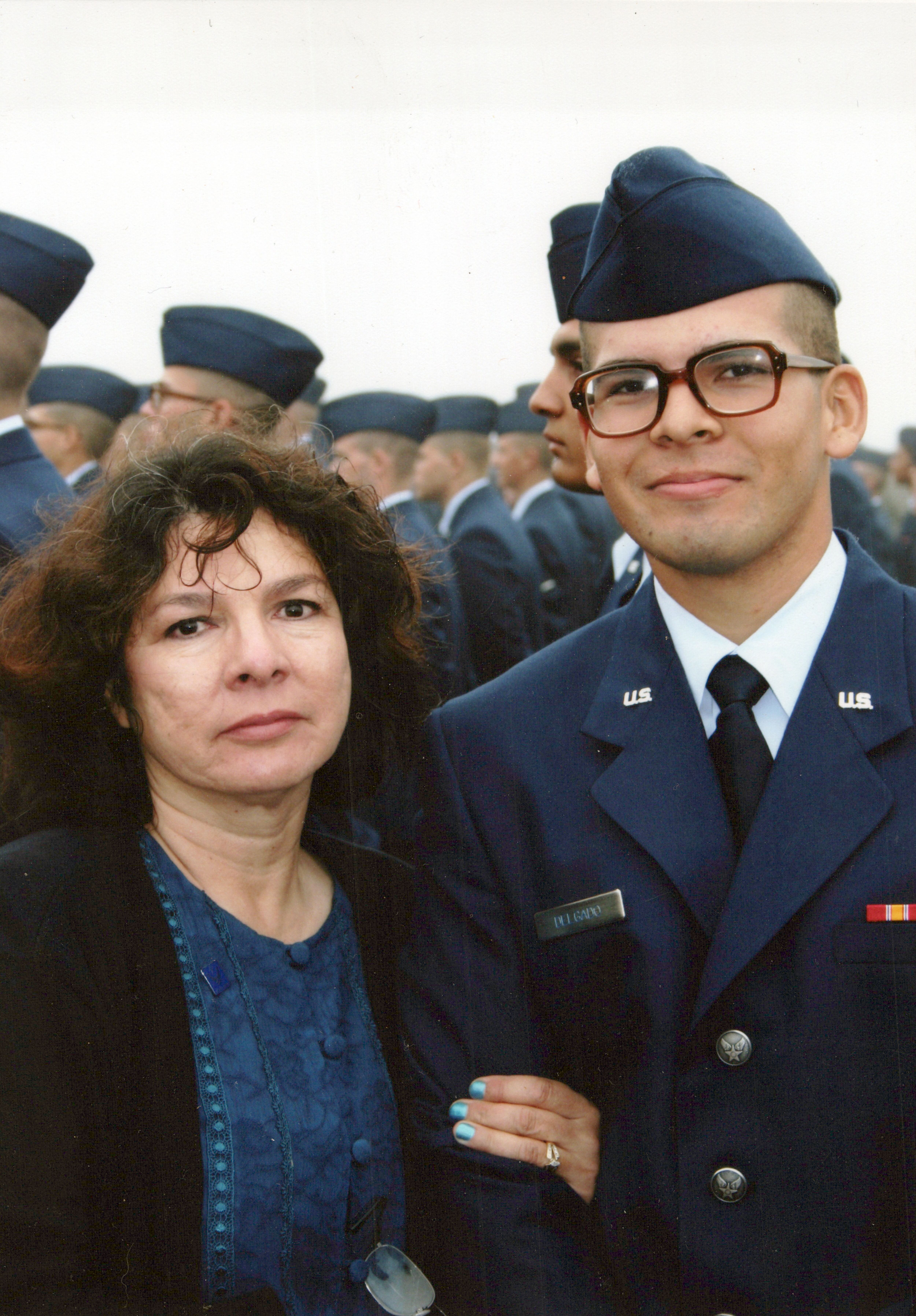 (Courtesy of Mario Delgado) Patricia Gallegos Delgado with her son Mario at his air force basic training graduation in 2005. 