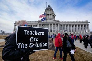 (Francisco Kjolseth | The Salt Lake Tribune) Curtis Benjamin joins educators, parents and other public school advocates as they rally on the steps of the Utah Capitol on Tuesday, Feb. 22, 2022. Advocates feel many anti-public school measures have been made by the Legislature this year.