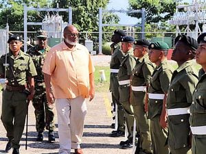 (Image via Belize Ministry of National Security) Belize Minister of National Security John B. Saldivar inspects security facilities Dec. 14, 2019.