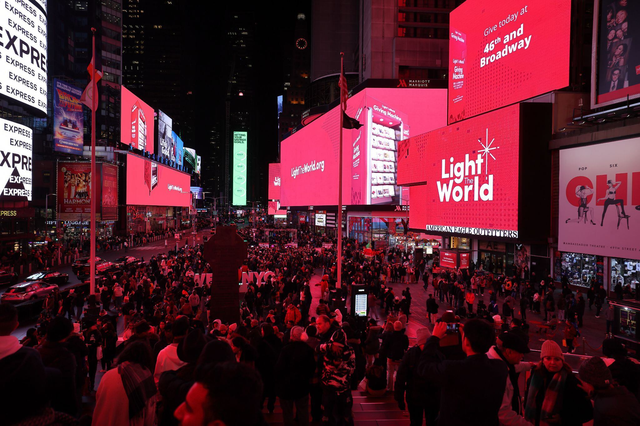 (The Church of Jesus Christ of Latter-day Saints) Crowds at Times Square in New York watch 15 digital billboards simultaneously display Christmas messages from The Church of Jesus Christ of Latter-day Saints in November 2023. The Utah-based faith experienced surprisingly strong growth in the U.S. last year.