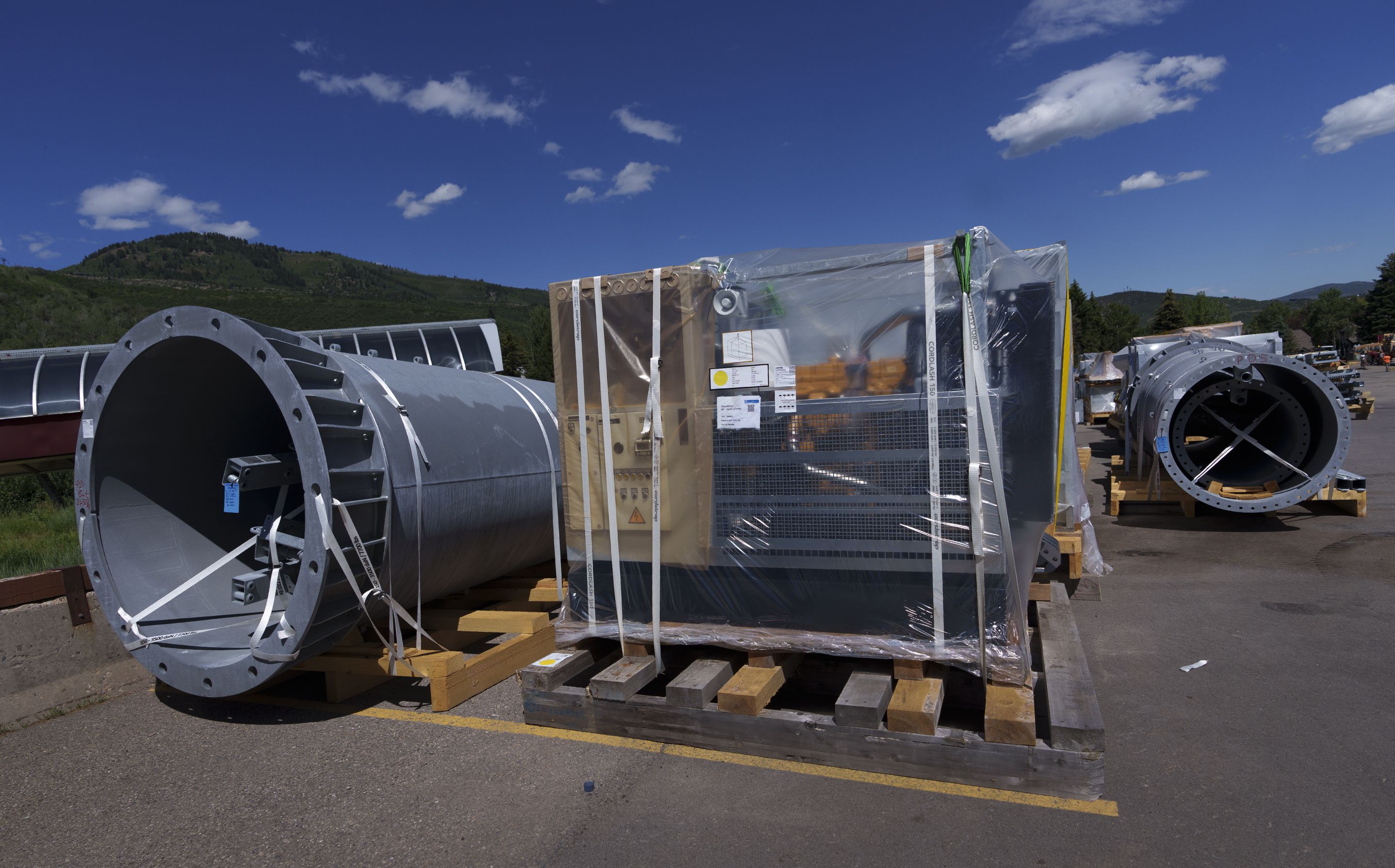 (Leah Hogsten | The Salt Lake Tribune) Parts for building a new Eagle lift at Park City Mountain Resort lie scattered around the resorts parking lot, Thursday, July 7, 2022.  A month earlier, residents blocked the resort from being able to install the lift because of discrepancies in resort capacities by two firms. 