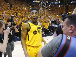 Utah Jazz guard Donovan Mitchell (45) celebrates after the team's 96-91 victory over the Oklahoma City Thunder during Game 6 of an NBA basketball first-round playoff series Friday, April 27, 2018, in Salt Lake City. The Jazz won the series. (AP Photo/Rick Bowmer)
