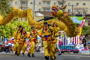 (Leah Hogsten  |  The Salt Lake Tribune) A giant dragon makes its way along 200 East during the Days of Õ47 Parade, Wednesday, July 24th, 2019 in Salt Lake City.