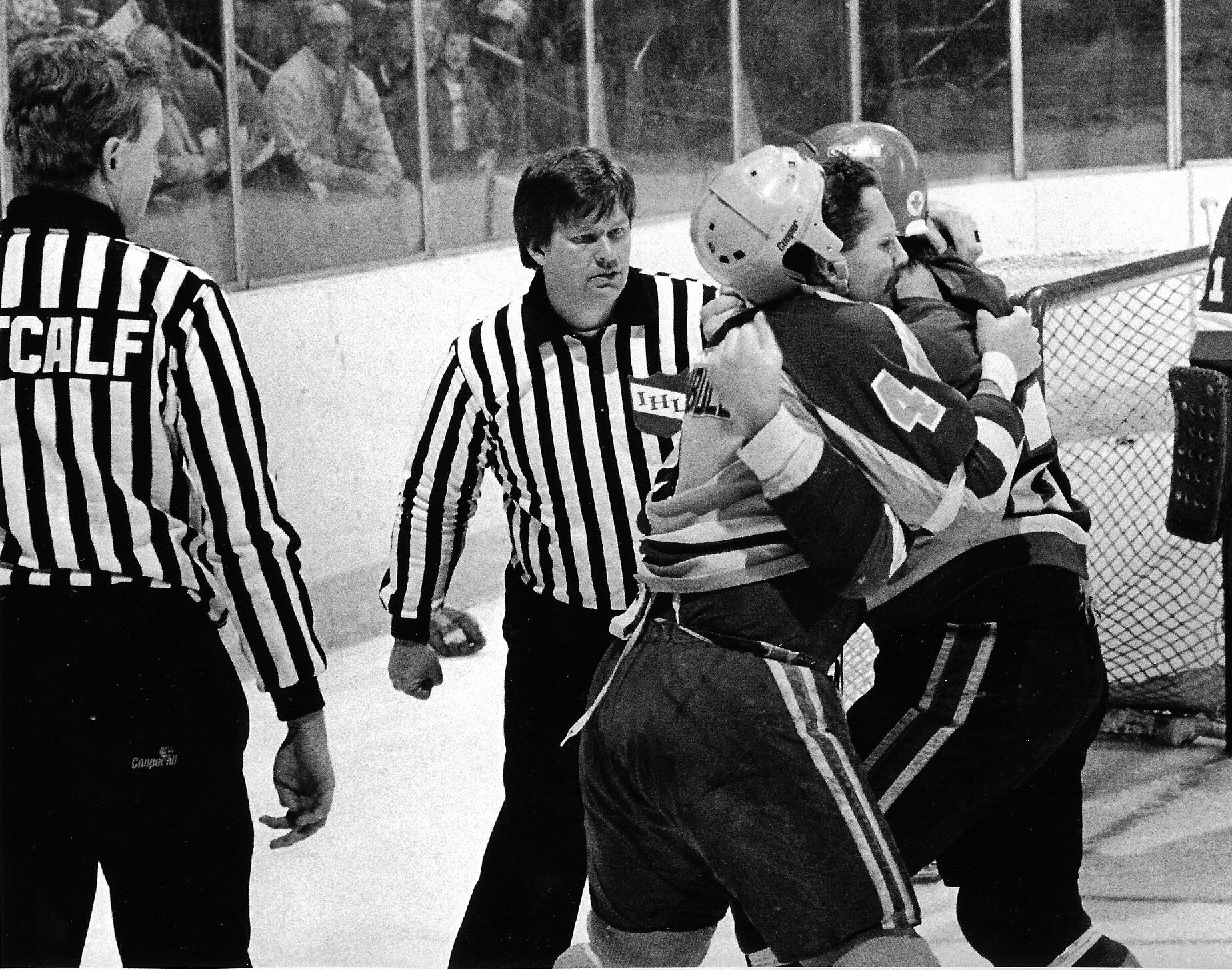 (Brian Acord) Salt Lake Golden Eagles enforcer Randy Turnbull (4) fights with an opposing player on the ice during a game in 1987.