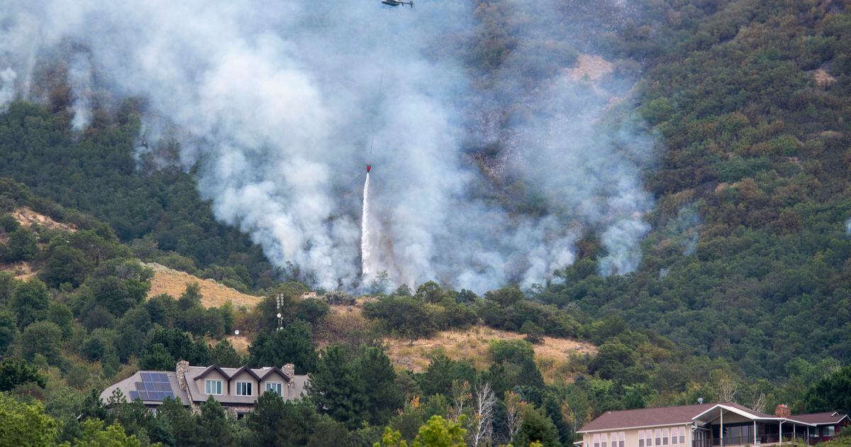 Fire in the foothills above Layton burns away from homes; evacuations