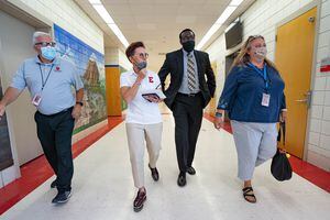 (Francisco Kjolseth | The Salt Lake Tribune) Salt Lake City School District Superintendent Timothy Gadson, center right, on a tour East High School on the first day back for the fall session on Tuesday, Aug. 24, 2021.