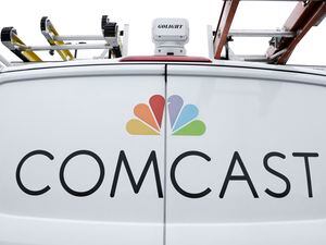 (AP Photo/Gene J. Puskar, File) This Jan. 24, 2019, file photo shows a Comcast truck. Comcast subscribers can now stream Utah Jazz games on the AT&T SportsNet app, a victory for fans who have long asked for more streaming options.