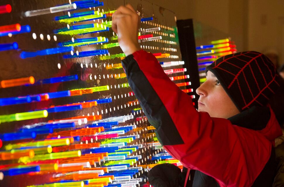 (Rick Egan | The Salt Lake Tribune) Nick Gordon, 13, plays in the game room at the Last Hurrah New Years Eve party at the Gateway, Sunday, December 31, 2017.