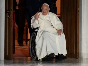 (Andrew Medichini | AP) Pope Francis seen in a wheelchair at the Vatican, Wednesday, June 22, 2022. Religion News Service columnist Thomas Reese predicts that, despite the many rumors, Francis will not resign as pontiff.