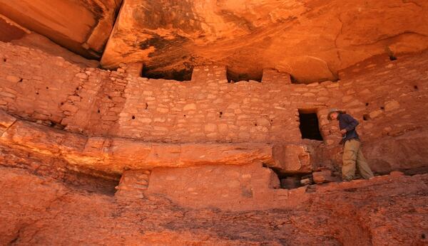 (Leah Hogsten | Tribune file photo) Hiker Richard Schwarz has visited Moon House four times and claims it is his favorite site to visit in southern Utah. Moon House is a Pueblo III-period cliff dwelling located in southeastern Utah on Cedar Mesa in McLoyd's Canyon. It was created by the Anasazi or Ancestral Puebloan peoples between 1150 and 1300 A.D. 