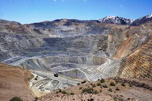 (Rick Bowmer | AP) Kennecott's Bingham Canyon Copper Mine is shown in May. The company is planning a 5,000-megawatt solar farm just below the mouth of the canyon.
