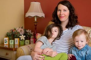 (Trent Nelson | The Salt Lake Tribune)  Rachel Hunt Steenblik with her children Cora and Soren in Provo, Tuesday April 3, 2018.