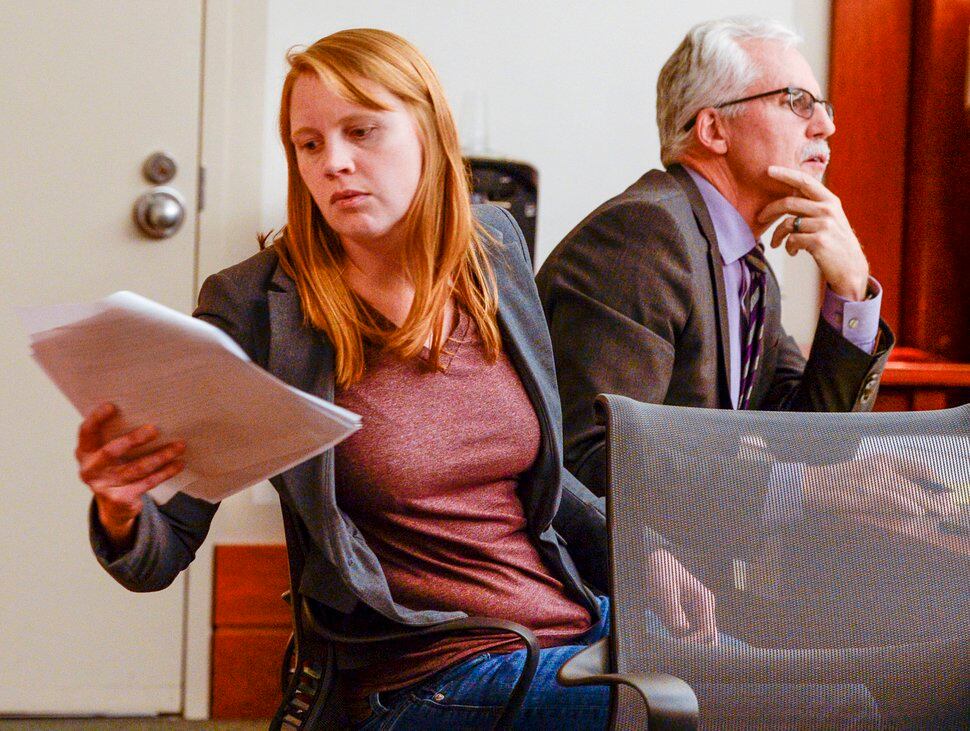 (Leah Hogsten | Tribune file photo) Tilli Buchanan is seen in Judge Kara Pettit's Third District Courtroom with her attorney Randy Richards on Nov. 19, 2019. Buchanan is facing charges of lewdness involving a child after police say she took off her shirt while cleaning out the garage and her stepchildren saw her breasts. 